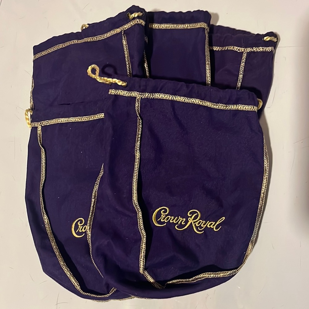 5 Purple crown royal bags. Multiple sets available